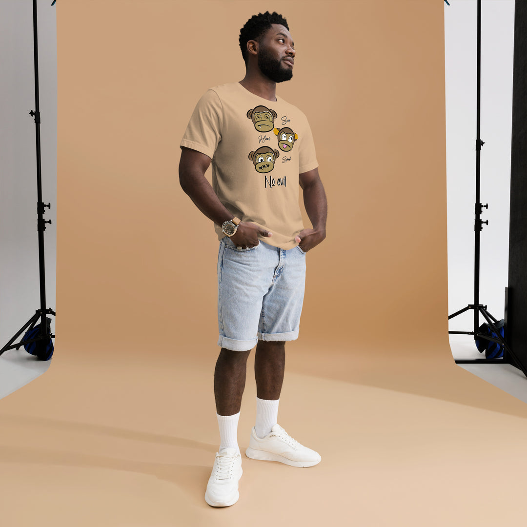 A young man in the studio is wearing the No Evil Theme Graphic Tee, full front view.