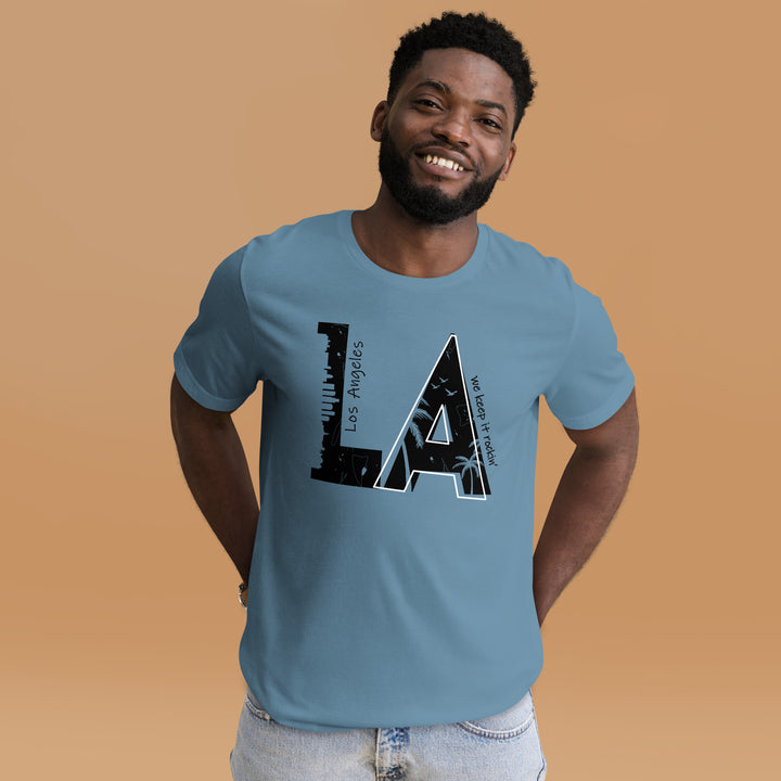 An urban man in the studio is wearing the L.A. City Theme Graphic Tee, front view.
