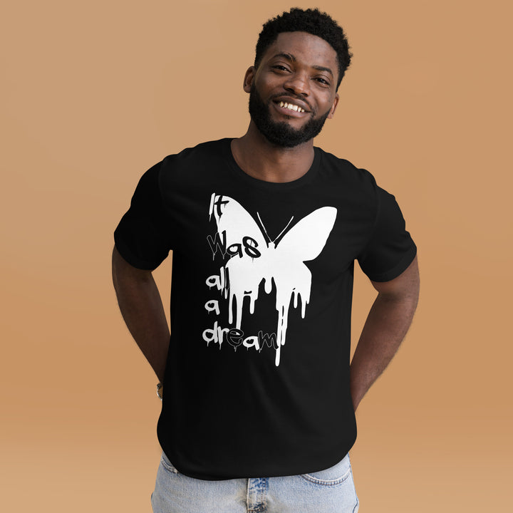 An urban man in the studio is wearing the Men’s Melting Butterfly And Slogan Graphic Tee, front view.