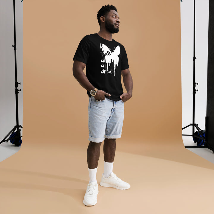 An urban man in the studio is wearing the Men’s Melting Butterfly And Slogan Graphic Tee, full front view.
