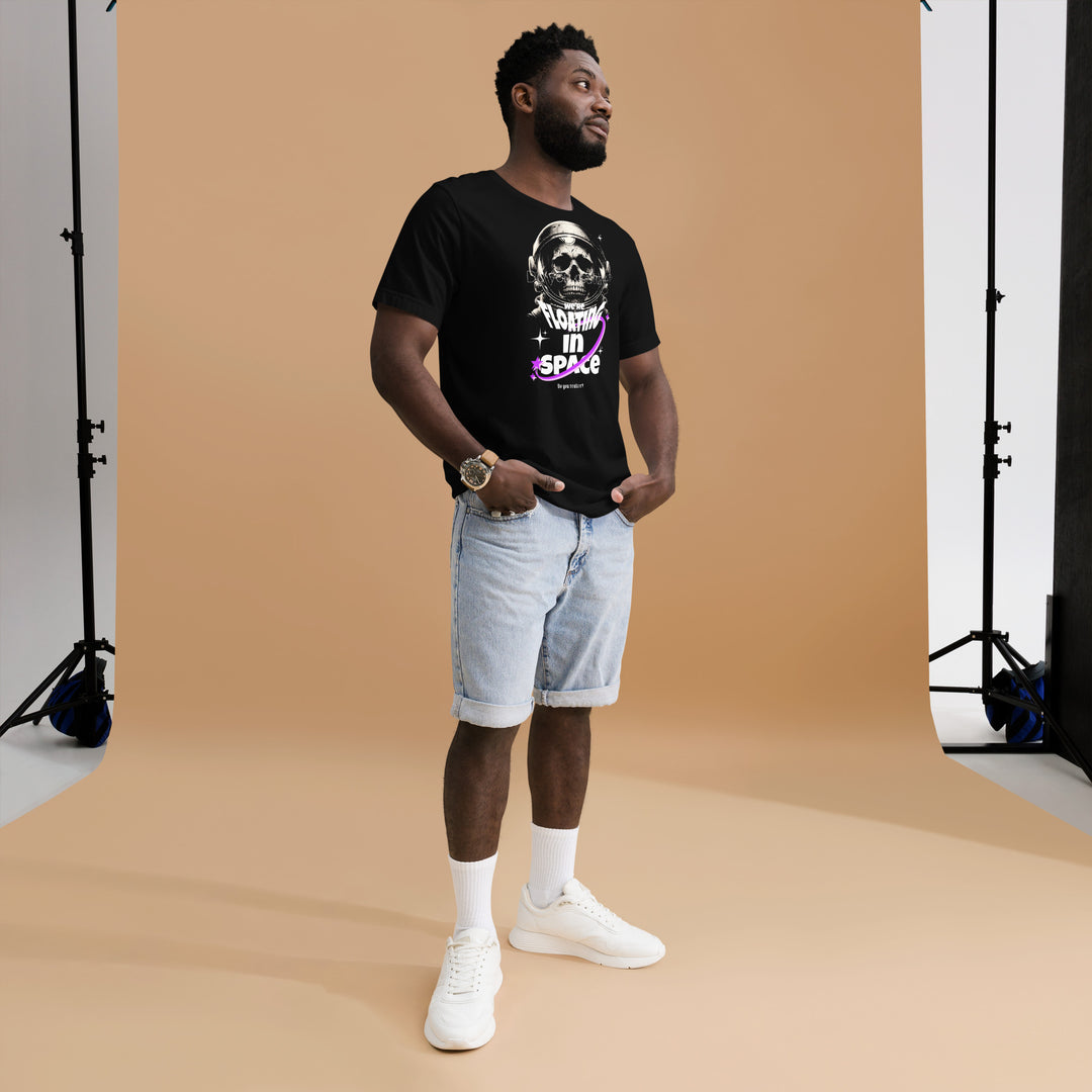 An urban man in the studio is wearing the Men's We're Floating In Space Theme Short Sleeve T-shirt, full front view.