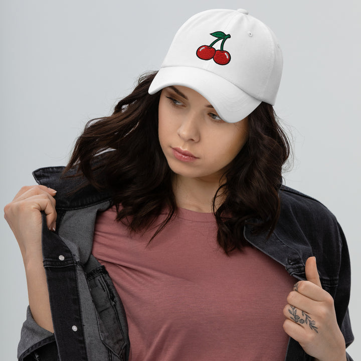 Cherry Bomb Dad Hat in White — Woman in Jacket Lifestyle Shot